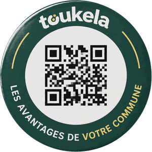 Le Jeton Toukela, verso : le mot toukela, un QR code unique et la mention « Les avantages de votre commune »